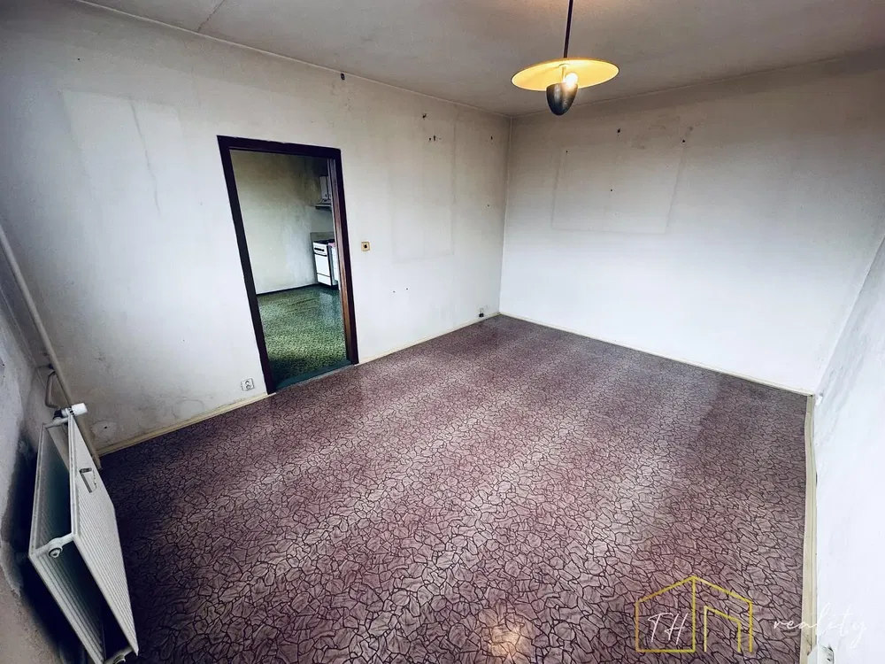 Bedroom; needs renovation, tile floor