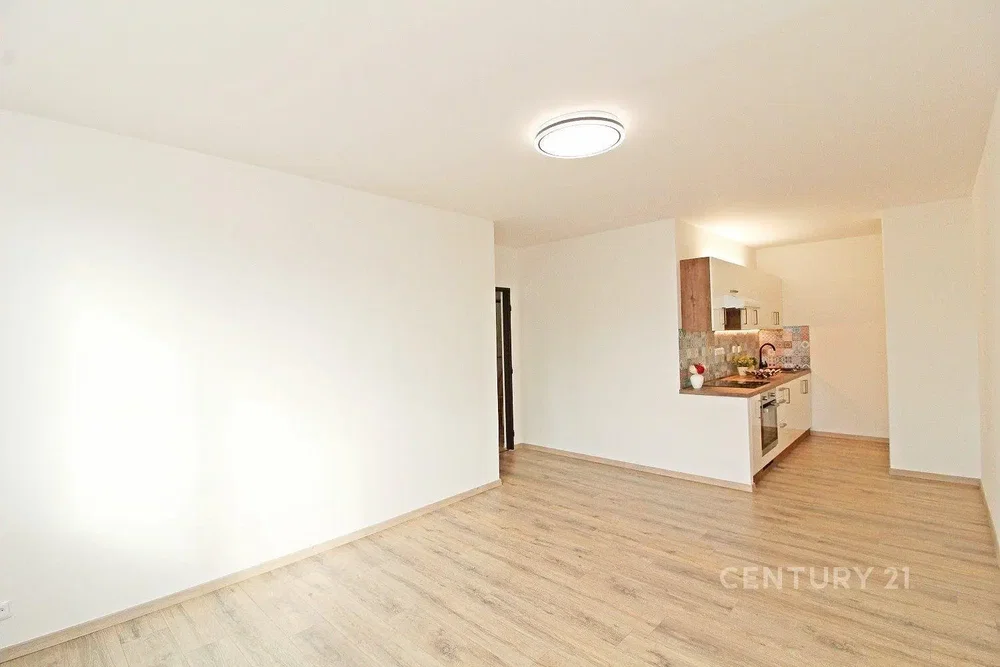 Living room; natural light, tile floor, renovated, kitchen appliances