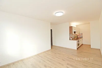 Living room; natural light, tile floor, renovated, kitchen appliances