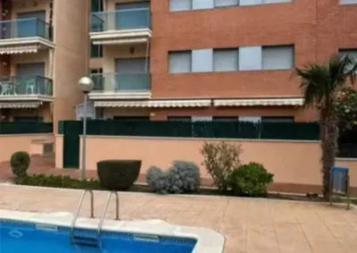 House and surroundings; view