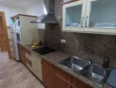 Kitchen; kitchen appliances, tile floor
