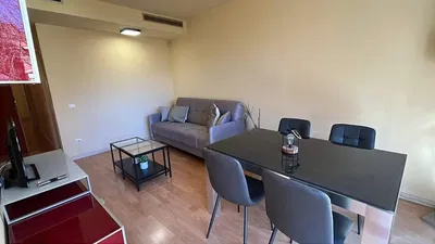 Soggiorno; pavimento in legno, luce naturale