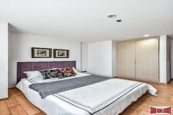 Slaapkamer; houten vloer, natuurlijk licht