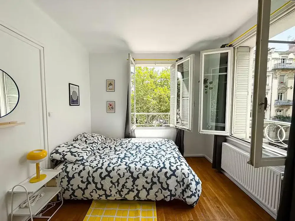 Bedroom; natural light, wood floor, view