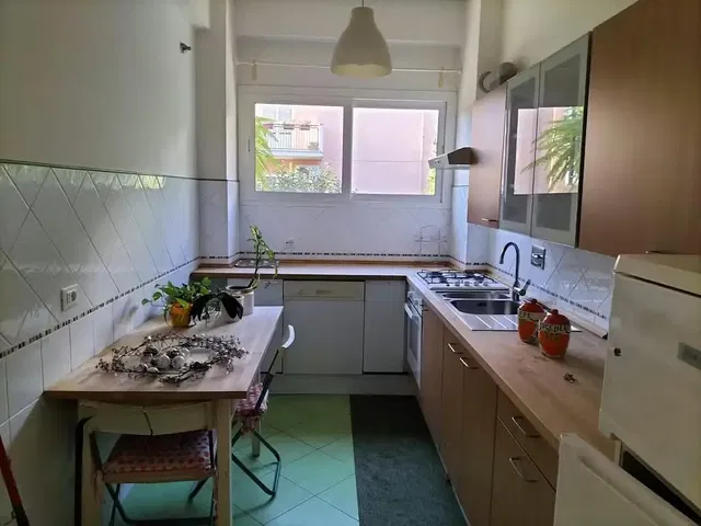 Kitchen; natural light, tile floor