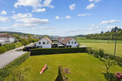 House and surroundings; view, natural light
