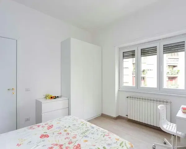Bedroom; natural light, wood floor