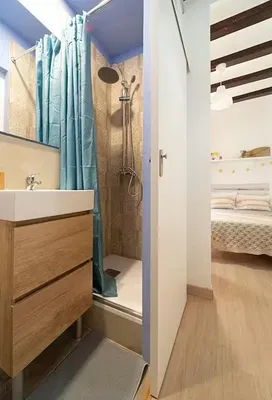 Bathroom; natural light, wood floor, renovated