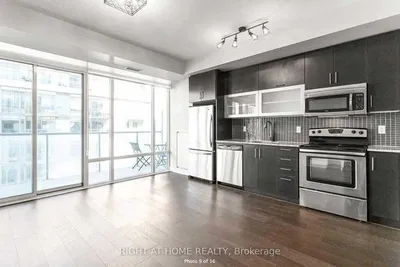 Kitchen; kitchen appliances, view, wood floor, natural light