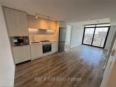 Kitchen; kitchen appliances, view, wood floor, natural light