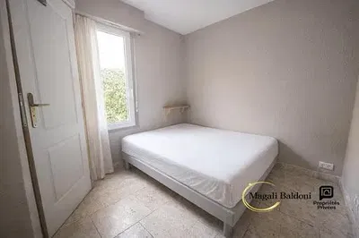 Bedroom; natural light, tile floor