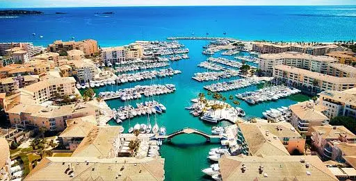 House and surroundings; view