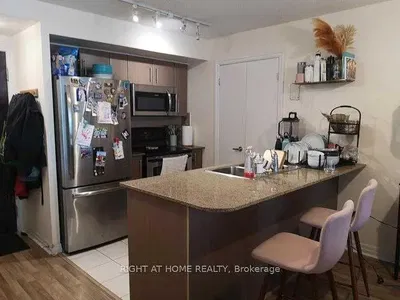 Kitchen; kitchen appliances, tile floor, wood floor