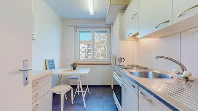 Kitchen; kitchen appliances, natural light, modern style, tile floor