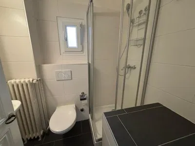 Koupelna; dlažba, přirozené světlo, po rekonstrukci