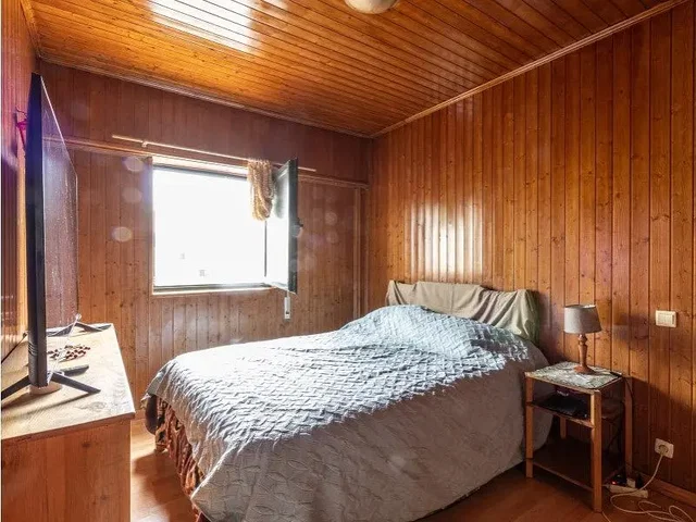 Bedroom; natural light, wood beams