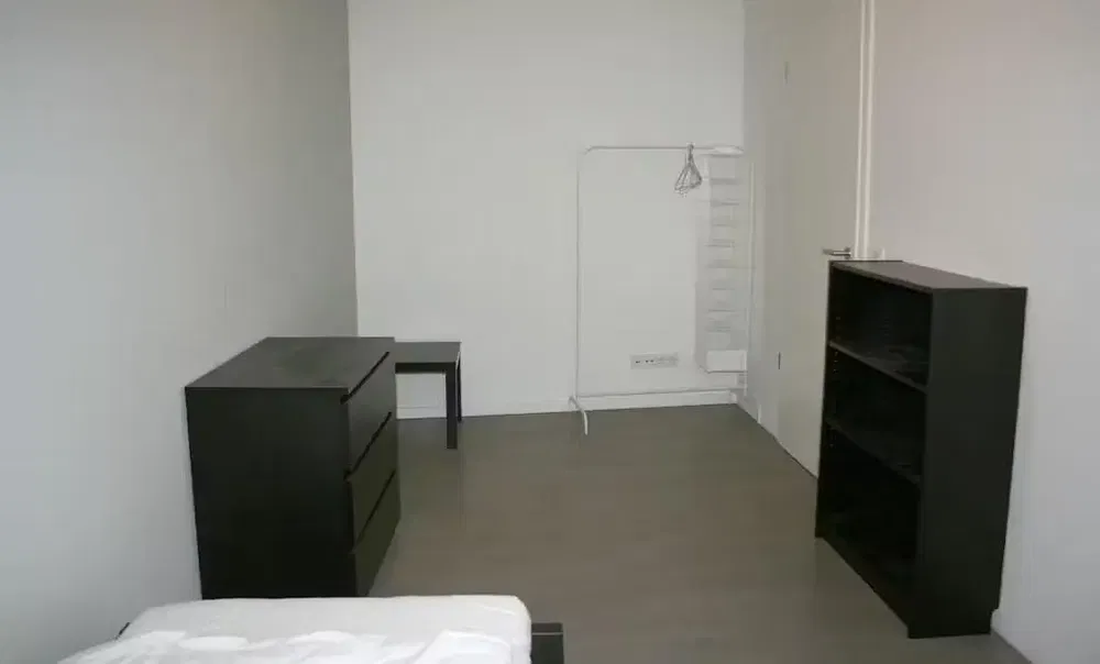 Bedroom; wood floor, tile floor, high ceiling, wood beams, renovated, needs renovation, natural light, dark interior, modern style, rustic style, commercial