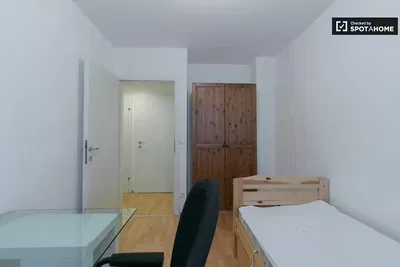 Bedroom; natural light, wood floor