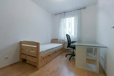 Bedroom; wood floor, natural light