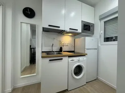 Kitchen; kitchen appliances, wood floor
