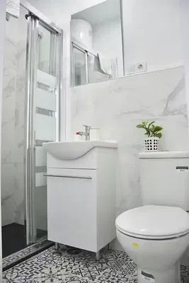 Bathroom; tile floor, natural light, renovated