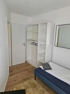 Bedroom; wood floor, natural light