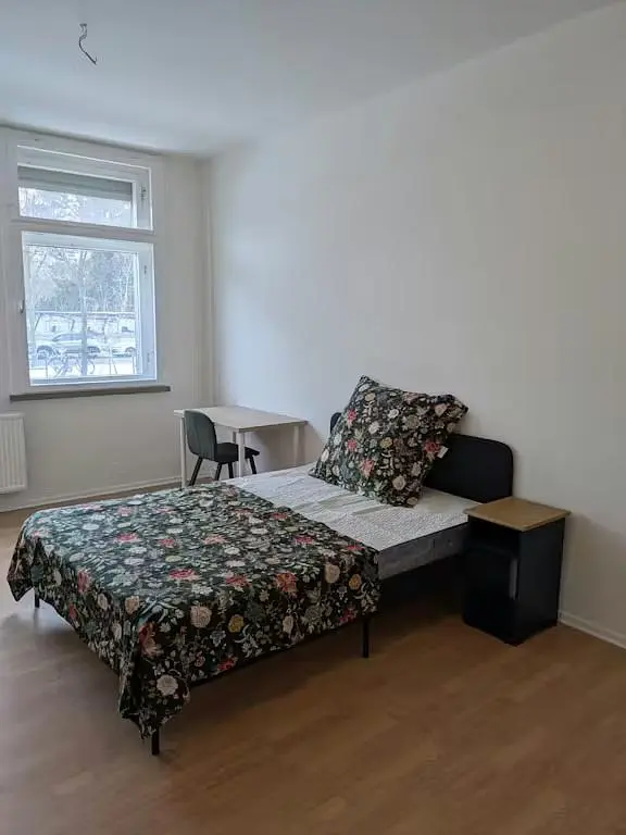 Bedroom; natural light, wood floor