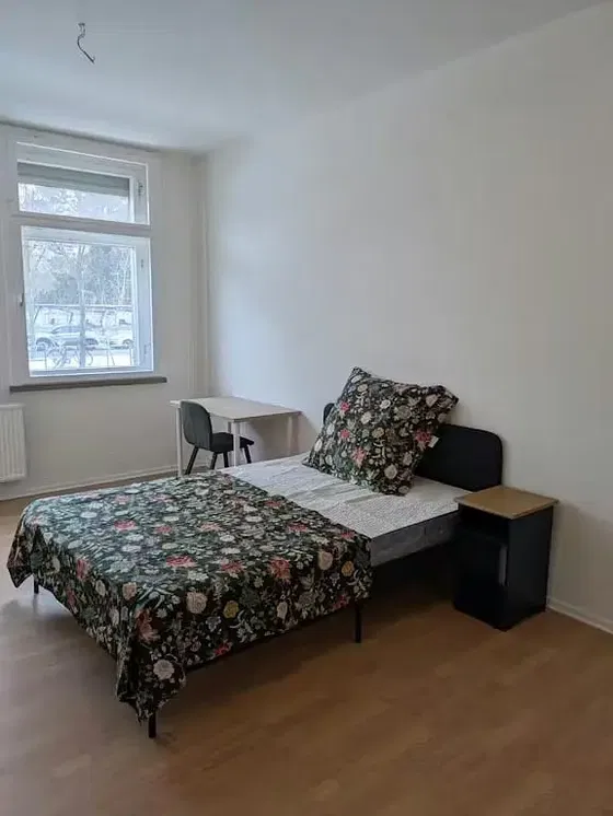 Bedroom; natural light, wood floor