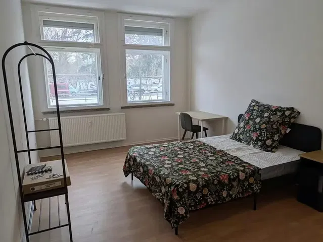 Bedroom; natural light, wood floor