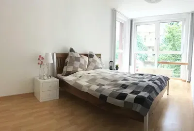 Bedroom; natural light, wood floor