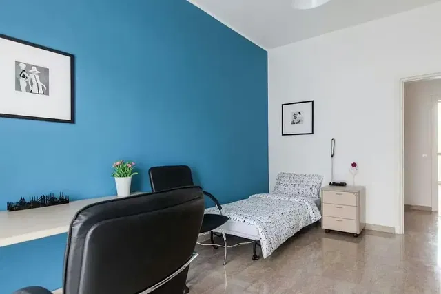 Bedroom; natural light, tile floor