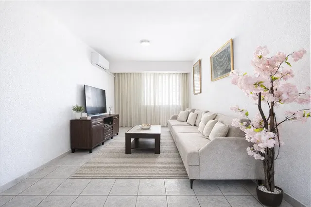 Living room; tile floor, natural light, modern style