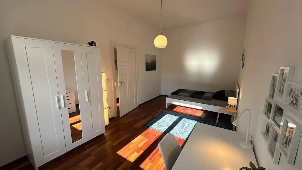 Bedroom; natural light, wood floor