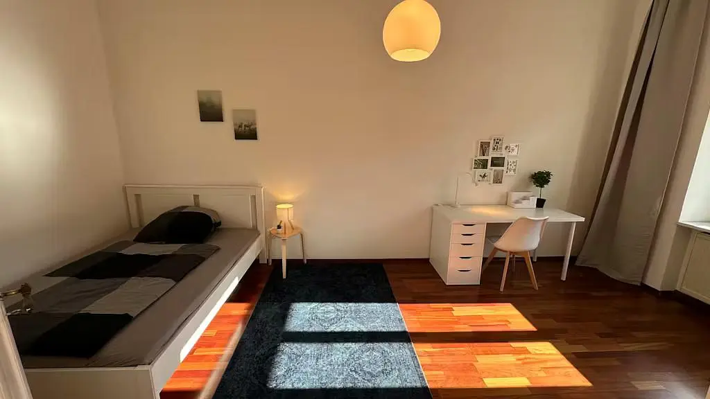 Bedroom; natural light, wood floor