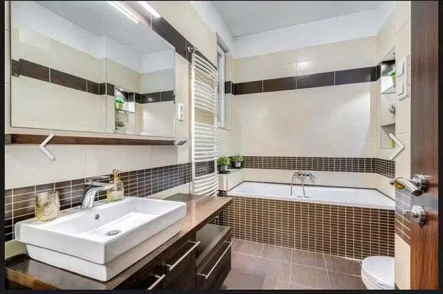 Bathroom; tile floor, renovated, natural light, modern style