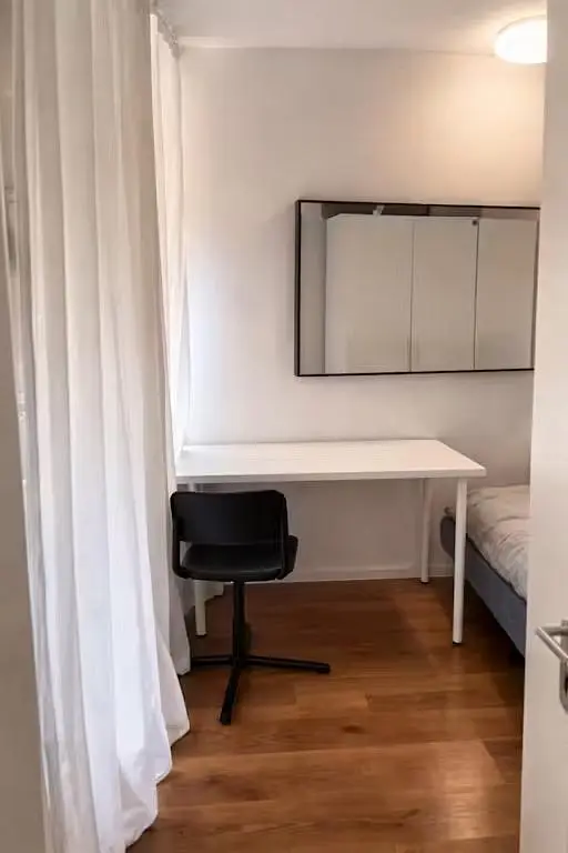 Bedroom; wood floor, natural light