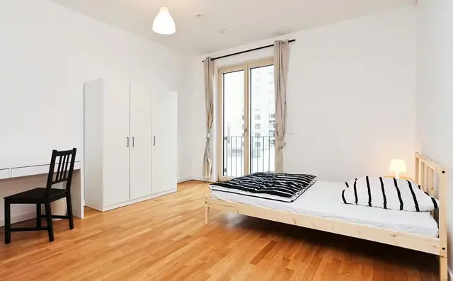 Bedroom; wood floor, natural light