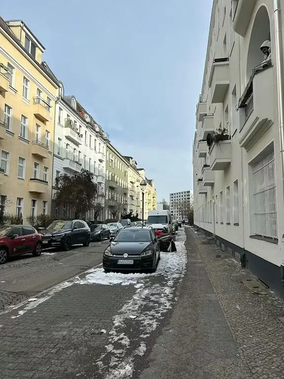 House and surroundings; view