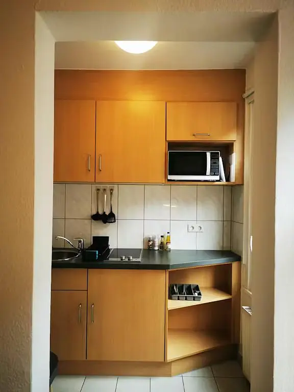 Kitchen; kitchen appliances, tile floor