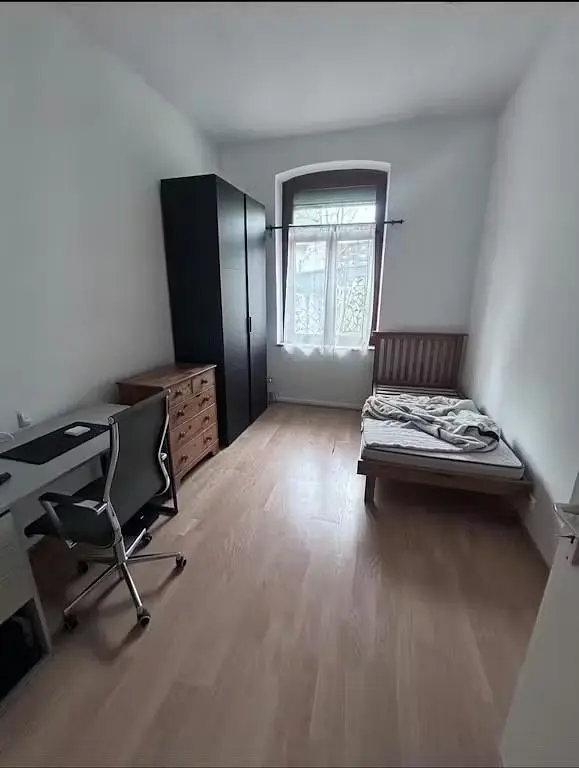 Bedroom; natural light, wood floor