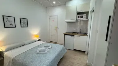 Bedroom; kitchen appliances, natural light