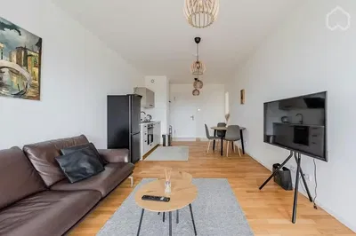 Living room; wood floor, natural light, modern style