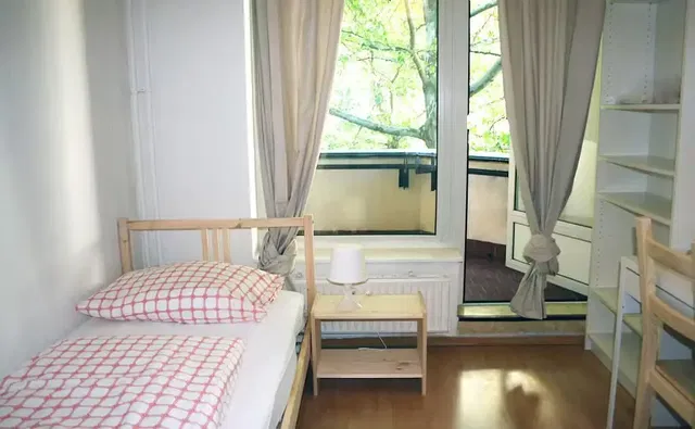 Bedroom; natural light, wood floor