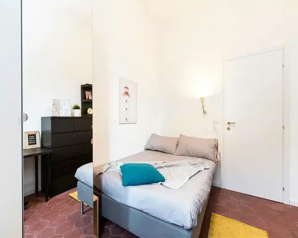 Bedroom; natural light, tile floor