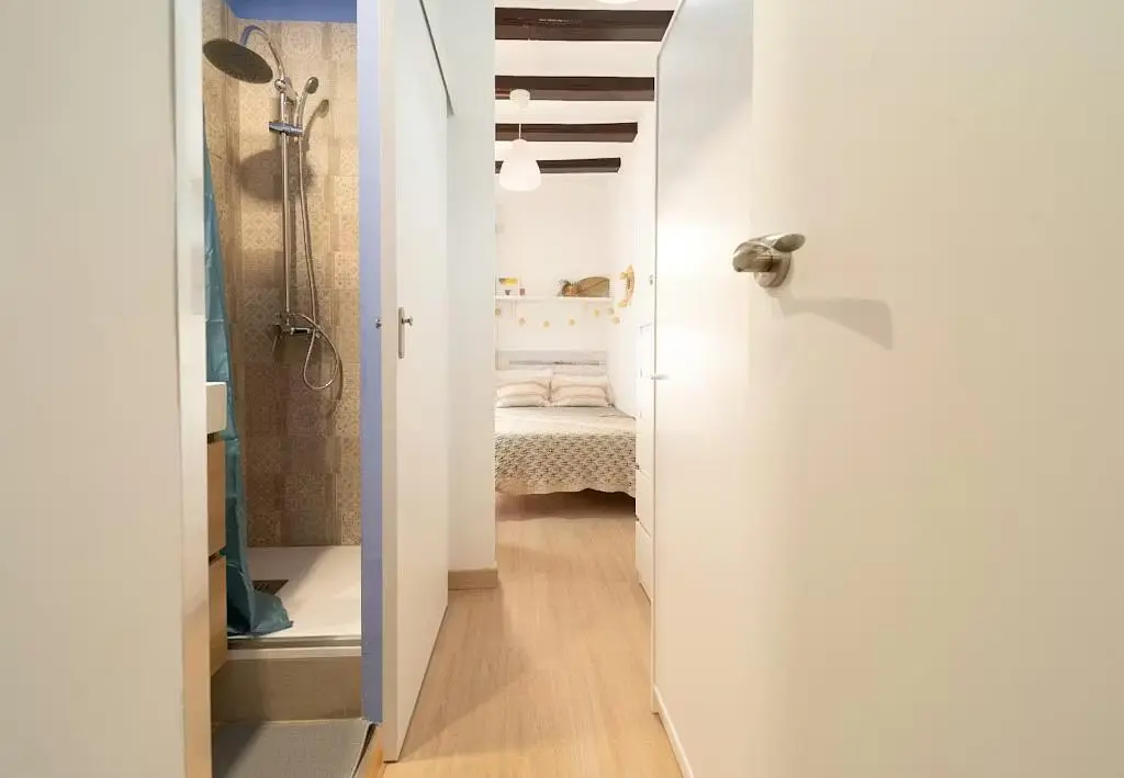 Bathroom; wood beams, wood floor, natural light