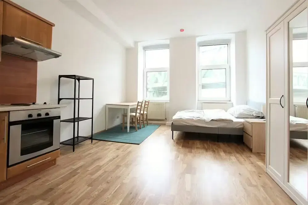 Kitchen; kitchen appliances, wood floor, natural light