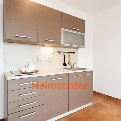 Kitchen; tile floor, kitchen appliances, renovated