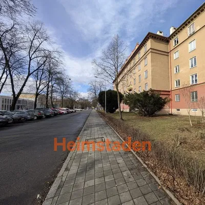 House and surroundings; view