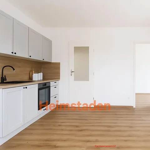 Kuchnia; sprzęt kuchenny, styl nowoczesny, podłoga drewniana, wyremontowany, światło dzienne