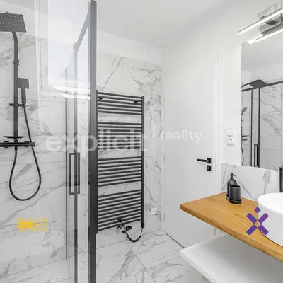 Bathroom; tile floor, renovated, natural light, modern style